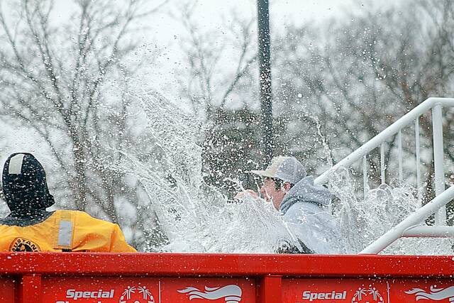 This years theme was Super Heroes. A team of five South Dakota Army National Guard soldiers from Engineering Company 211 were among those who jumped into the 40-degree water in the Plungster, a custom-built mobile plunge pool trailer designed for such Special Olympics events as this one and being used on March 14 at Hillcrest Elementary School for the first time. (John Kubal/Brookings Register)