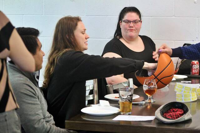 The Brookings Register and Wooden Legs Brewing Co. hosted an NCAA Tournament Kick-off event Wednesday celebrating the beginning of March Madness. Area business people adopted tournament teams with the opportunity to grow their marketing value with the paper.