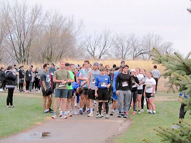 Runners await the start of a race.