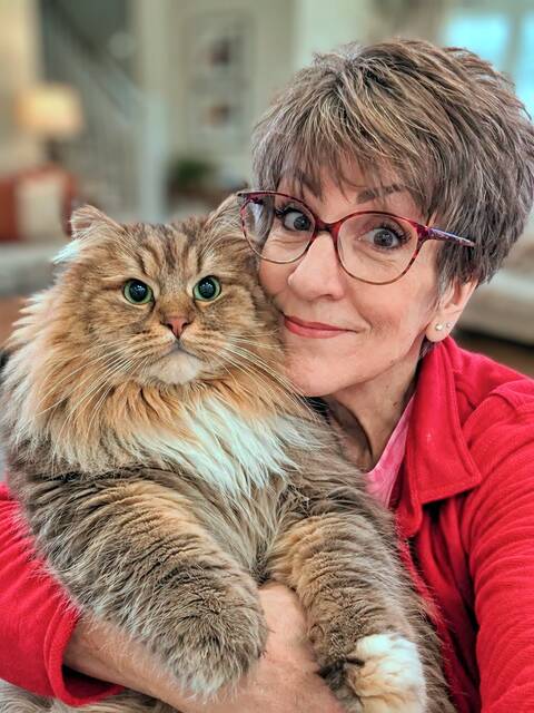 Lori Schultz has many plans for retirement, but among them will be enjoying additional time with her beloved cat, Simon.
                                 Courtesy photo