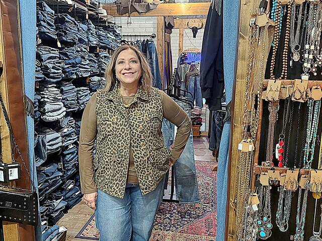 Christen Cunningham, shown on March 19, is the owner of Christen & Company clothing store, a boutique located in downtown Centerville.