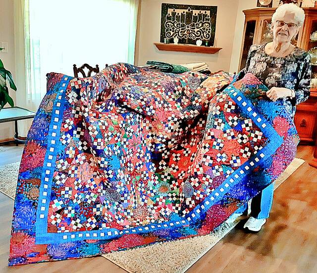 The Brookings Area Quilt Guilds show this year featured quilter Rose Horner presenting one of her 69 quilts that will be displayed at the show on April 18.