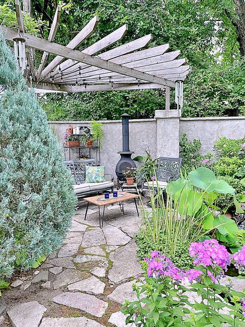 A patio transformed into an outdoor oasis and entertainment area.