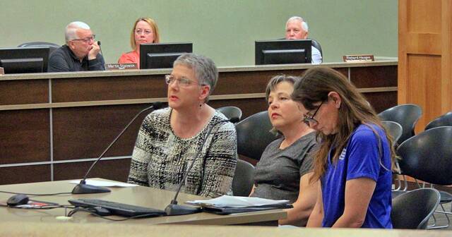 Representatives from the Brookings Regional Humane Society made their case to the Brookings County Commission on April 21 regarding funding for a new facility. From left are Tammy Knudtson, Angela Daly and Maia Moore.
                                 Mondell Keck/Brookings Register
