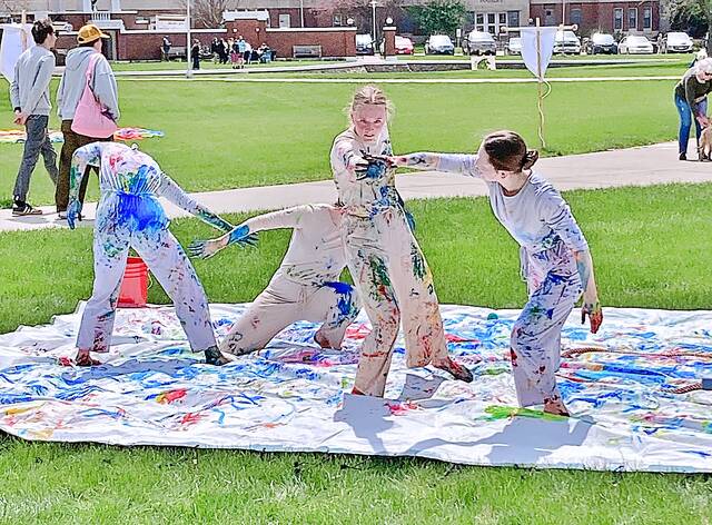 SDSU students combine paint and interpretive dance at the What Makes Your Soul Breathe? event on campus on May 2.
                                 Doug Kott/Brookings Register