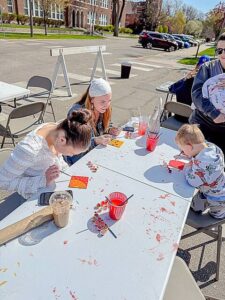 Artists paint tiles for mural project in Brookings