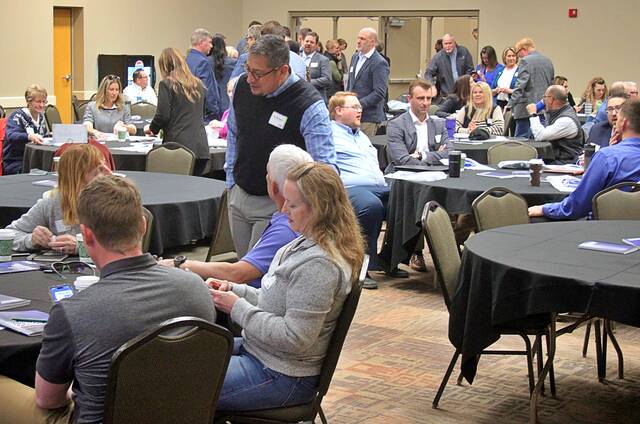 More than 100 business and community leaders took part in the Brookings Economic Summit on May 5 at the Dacotah Bank Center, including, center, City Manager Paul Briseno.