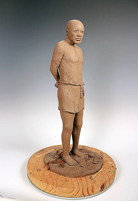 Porter Williams, Slave Standing, Hands Behind Back, c. 2000-2015, clay on wood base is shown courtesy of Glennis Williams Collection.