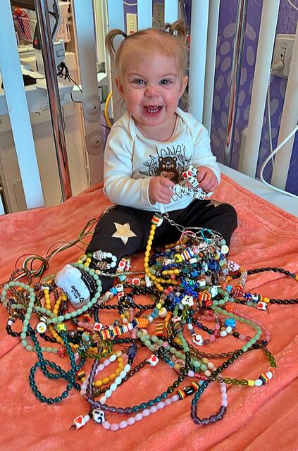 Rinken is seen in Omaha, Nebraska, with her Beads of Courage from when she was born to April 9, 2022. Each bead represents a medical procedure she endured, from needle pokes to surgeries.
Courtesy photos